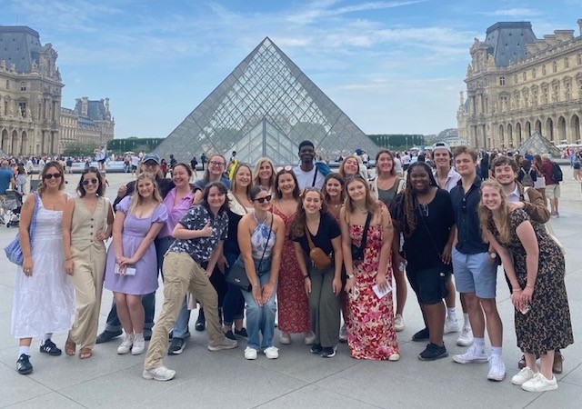 School of Communication students in front of the Louvre Museum in Paris France