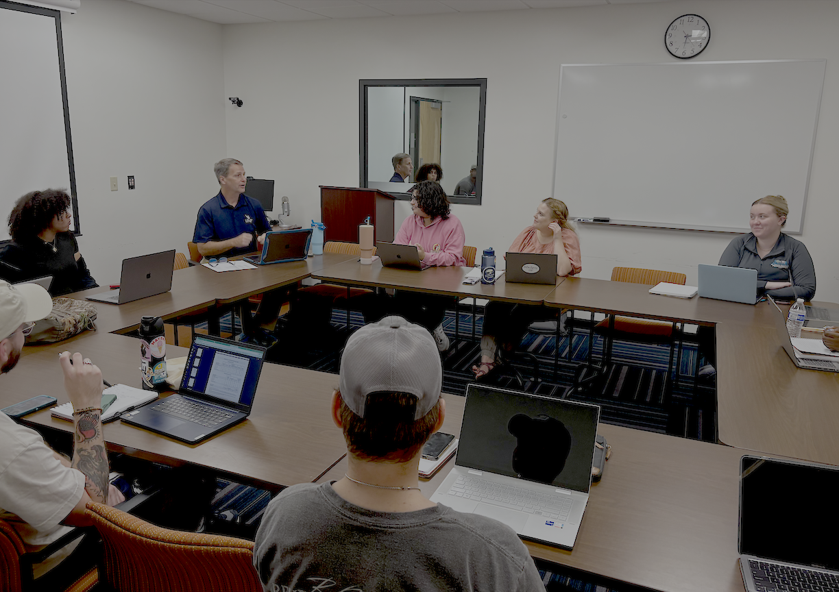mock focus group of people sitting around a table
