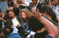 press surrounding a person