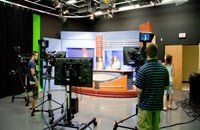 tv crew working on set of news station