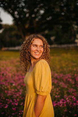 UNF Student in a field