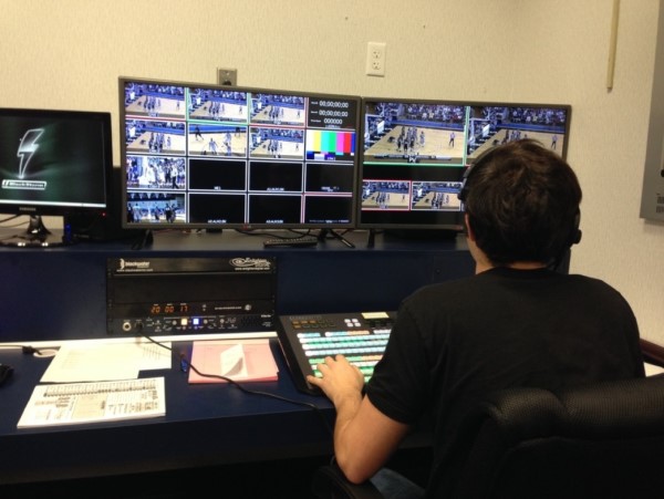 Communication student Anthony Cinca directs a four-camera live production of UNF basketball.