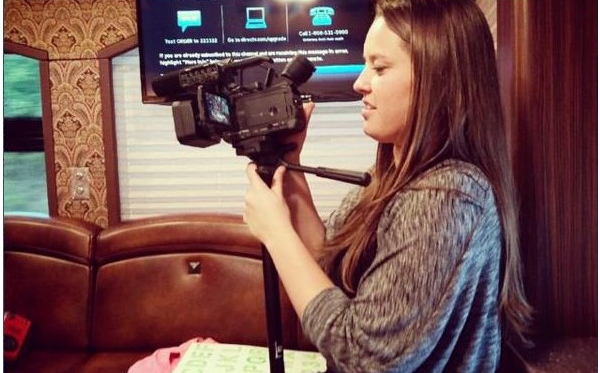 Tillie McNally sets up a camera for the show “Simply Sara” on My Country Nation