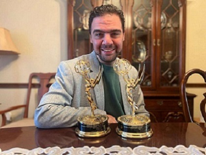 UNF alumni student, Fouad, with two Emmys.