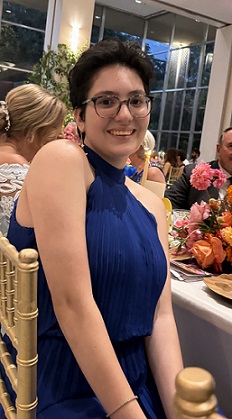 Alumni, Lez Correia, at a banquet.