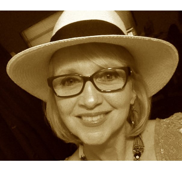Sonja Mongar with straw hat on.