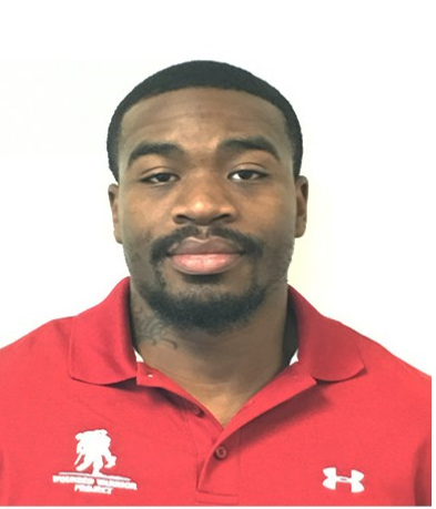 Derrick Richardson, wearing a red Wounded Warrior Project shirt, is the communications coordinator for the organization