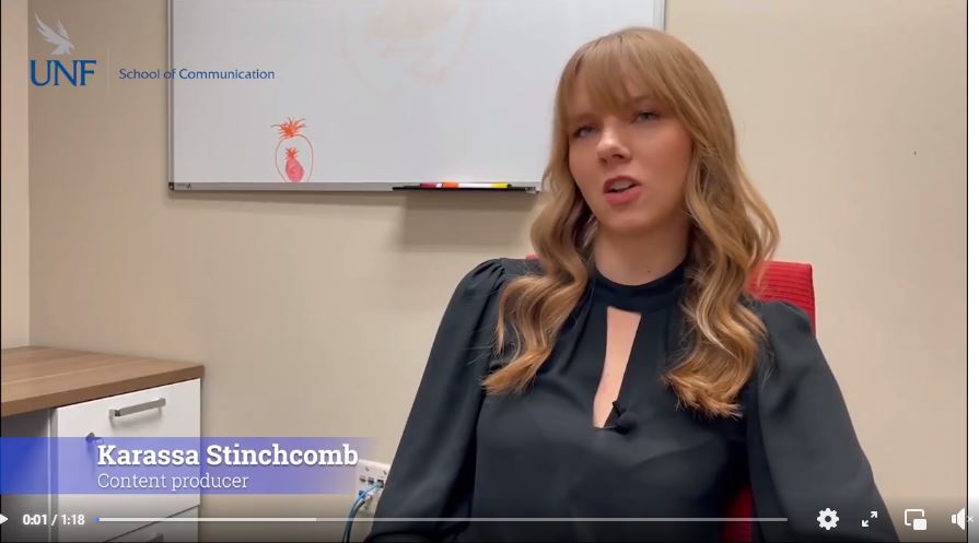 Photo of Karassa Stinchcomb in an office.