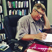 Mitchell R Haney working at desk