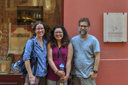 Faculty and student outside historic archive