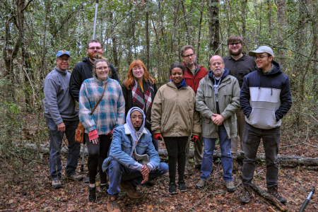 Students and faculty at forest research field site