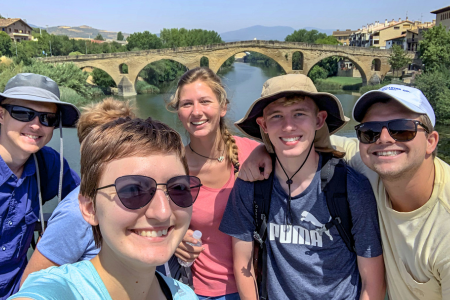 Students on historic bridge during study abroad