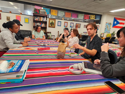 UNF students embroidering at the annual event, Embroidery for Peace and Memory