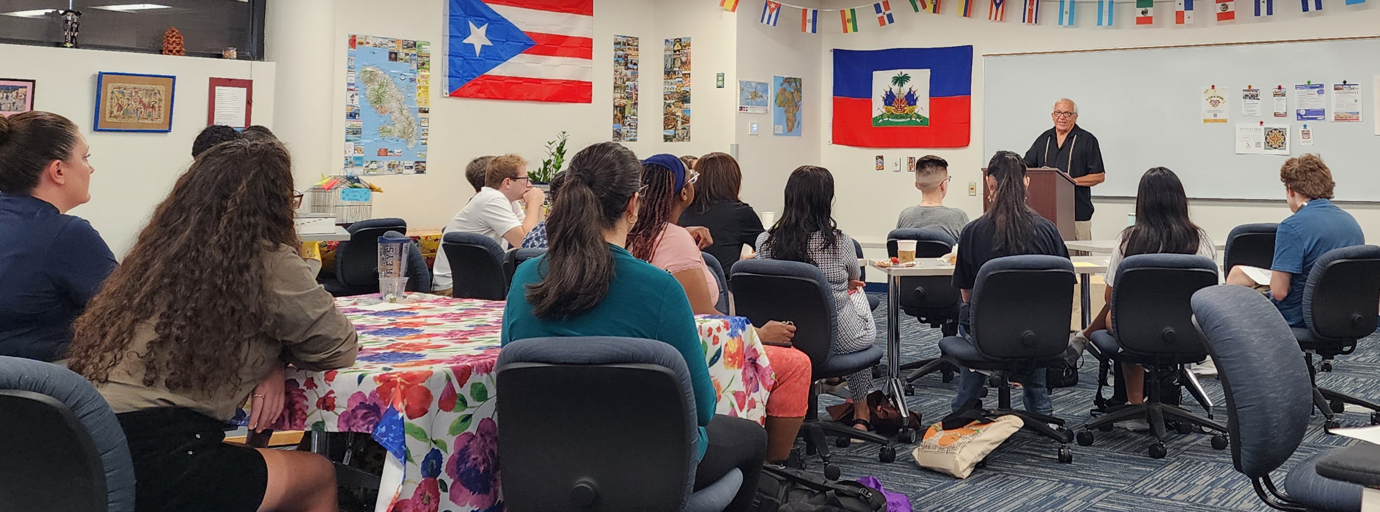 UNF students listen to a presentation by professor emeritus of Spanish, Jorge Febles