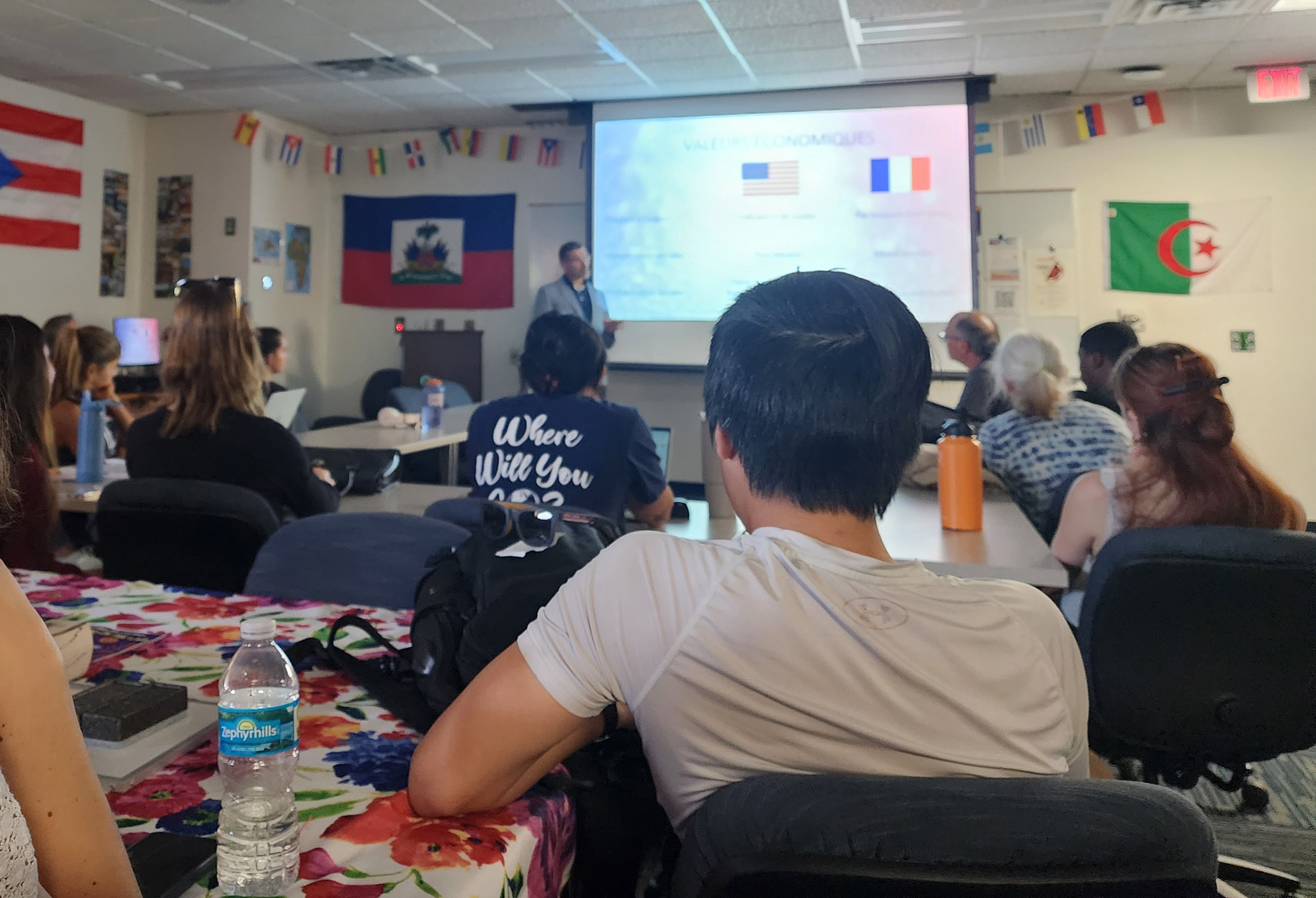 UNF students listen to a presentation on business culture in France with Philippe Singer, CFO of Predator Group