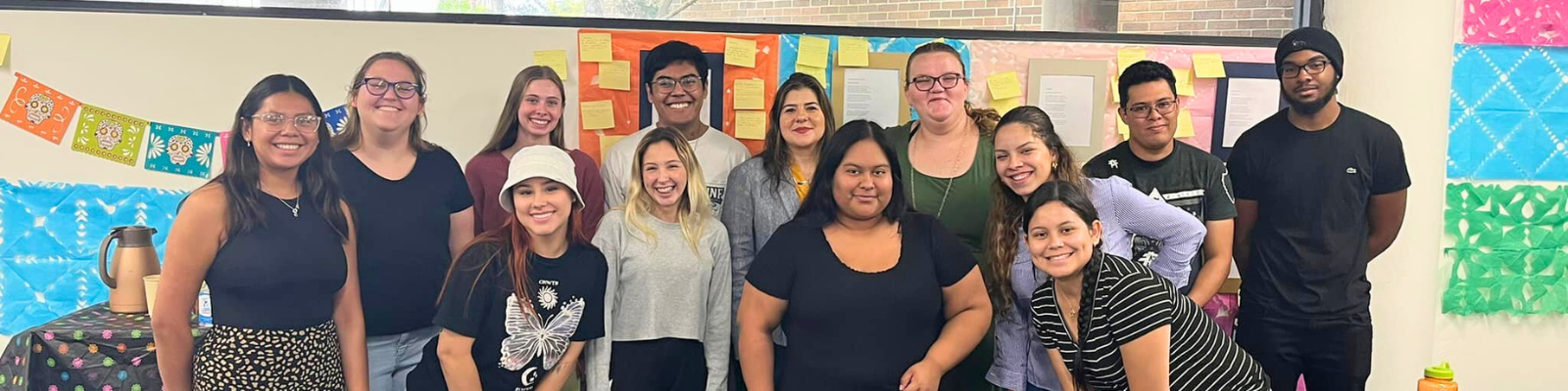 Group of LLC students standing in a row smiling