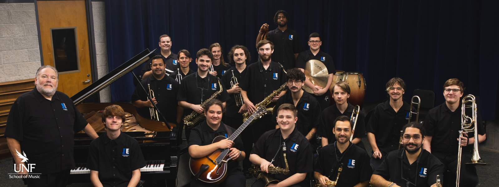 Group of students posing with instruments.