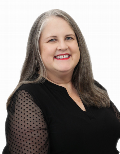 Woman with medium length gray hair