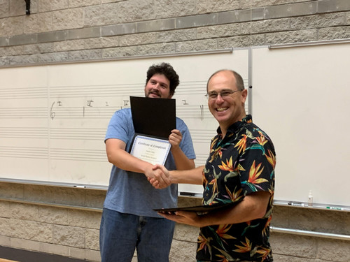Student receiving certificate