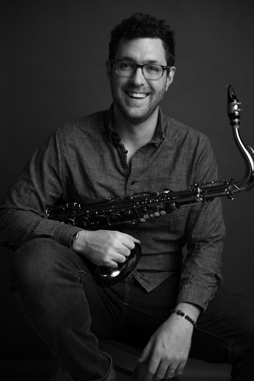 Man holding saxophone
