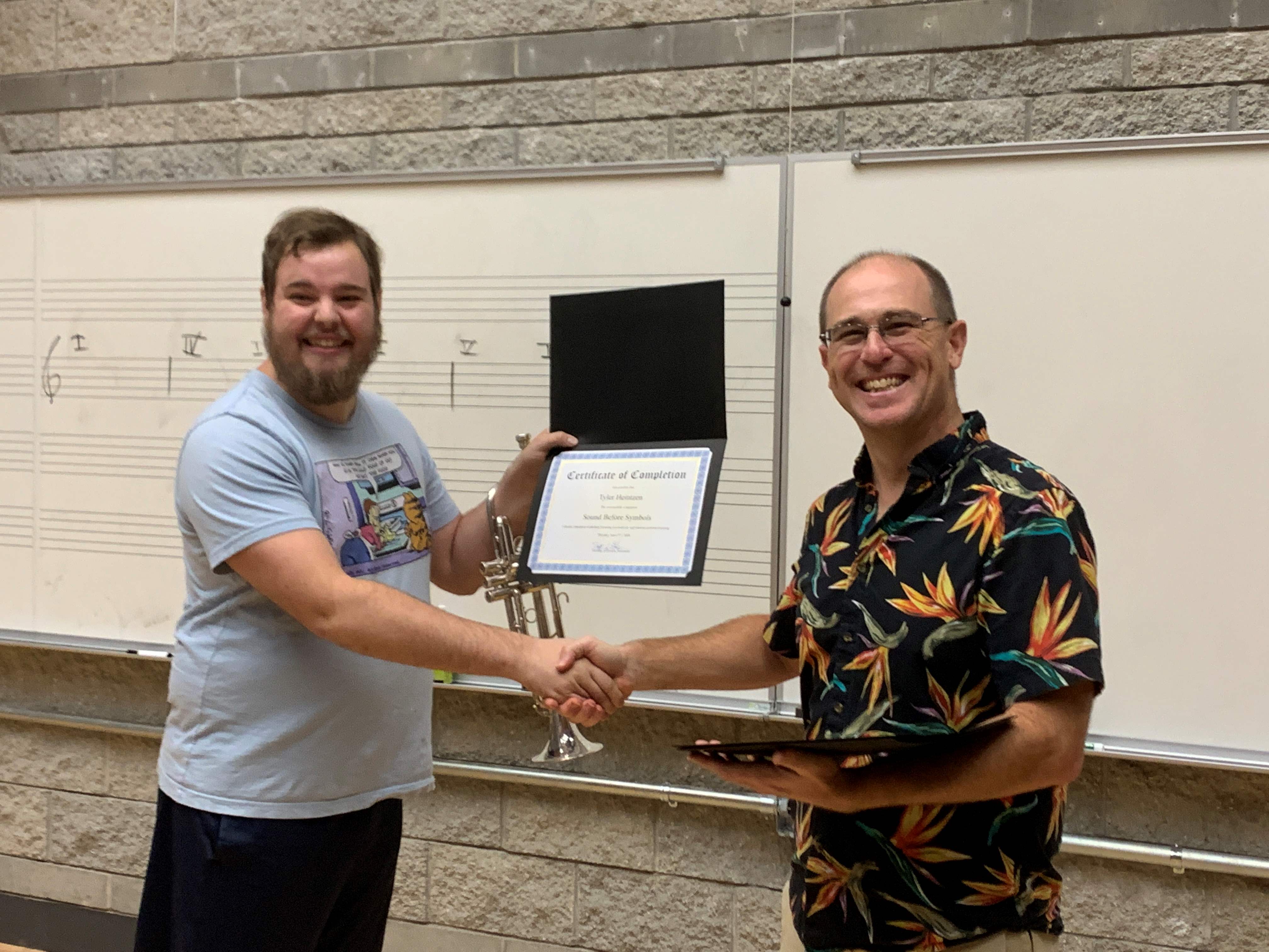 Student receiving certificate