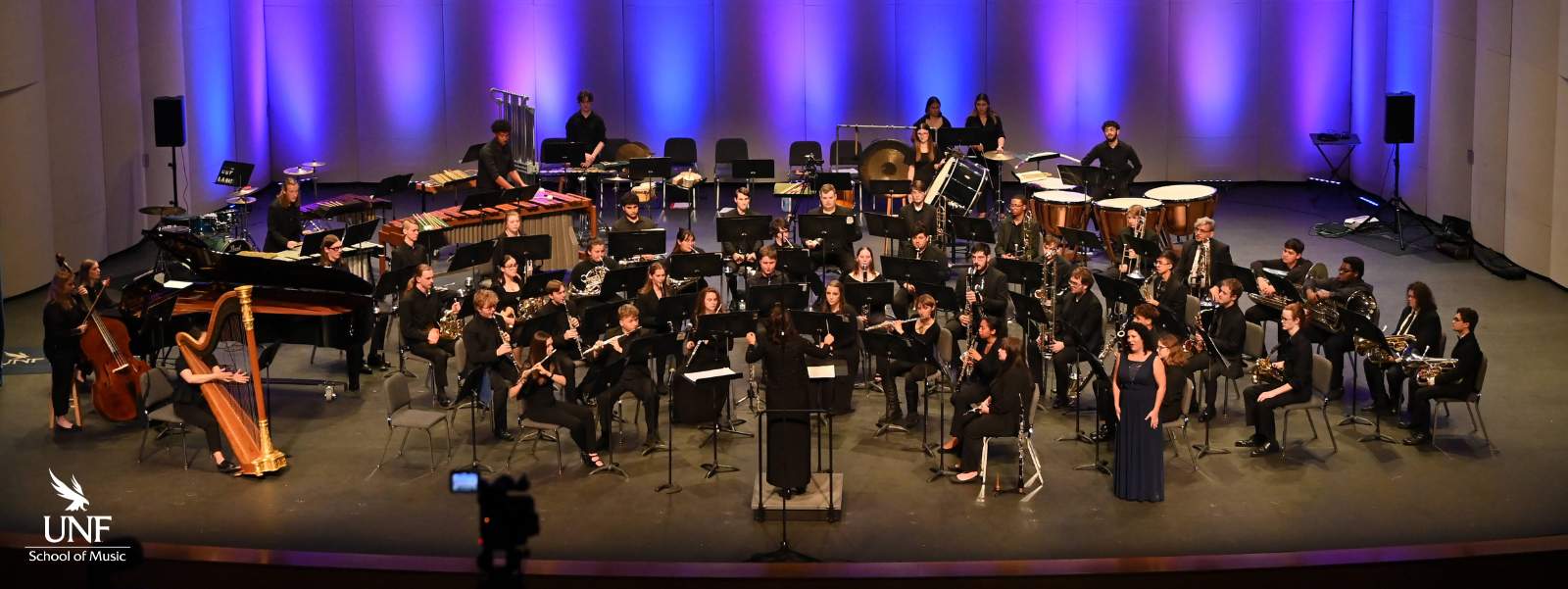 Performers on stage playing during concert