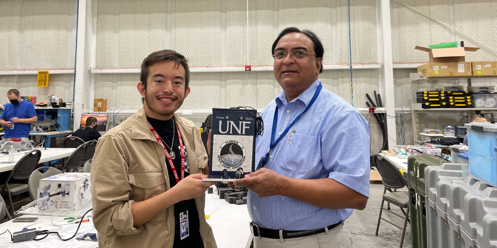 Student and Faculty work with NASA