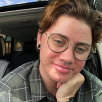 Calvin Canfield in a car