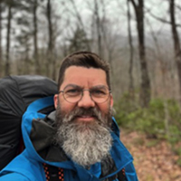 Brian Fullford standing in dreary wilderness
