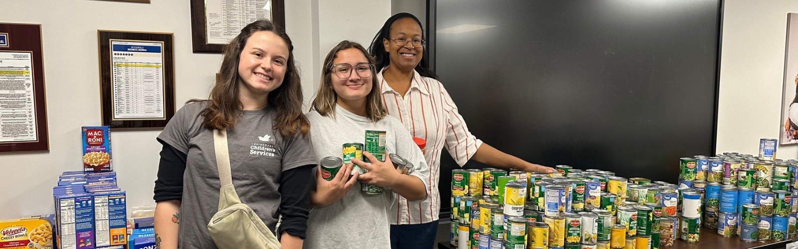 Group of students and teachers at donation center