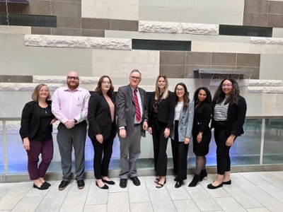 HEA students and Dr. C at a conference