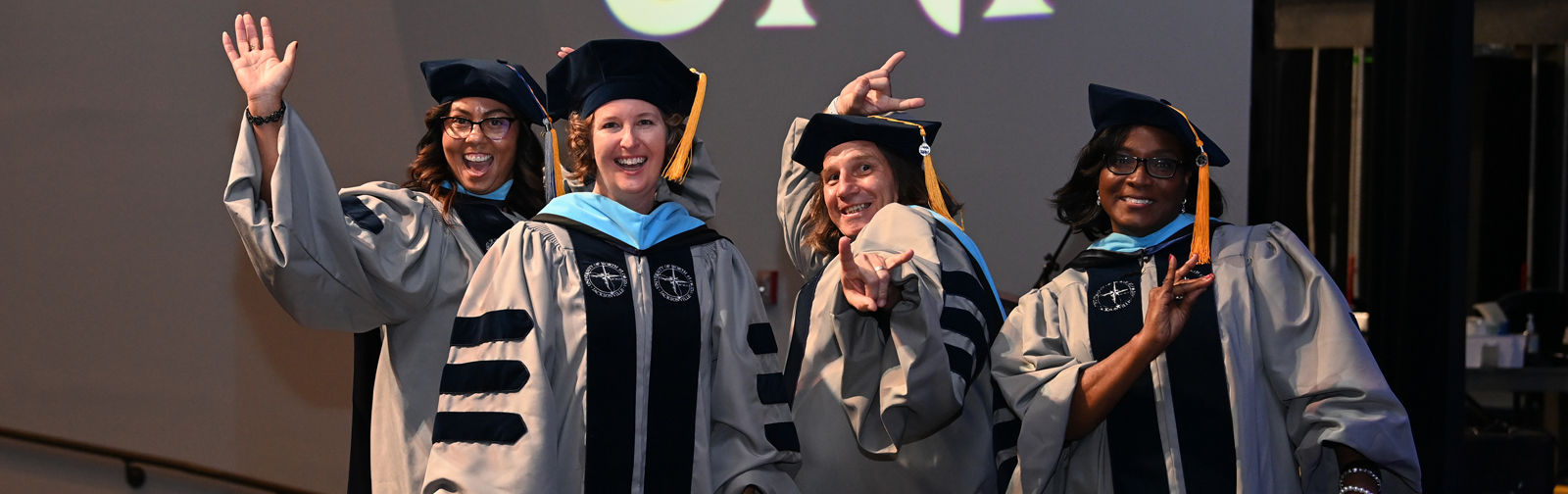 graduating students in graduation garb