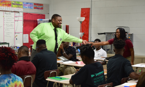 Jacksonville teachers shaking hands