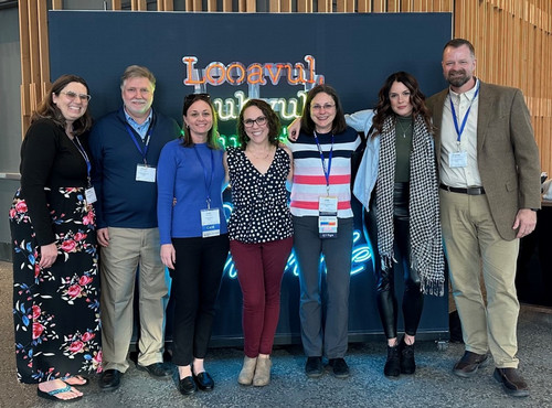 Group of SPIDERS scholars and David Hoppey at conference