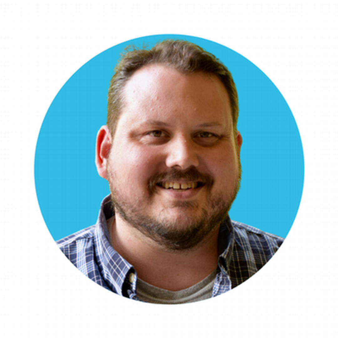 Headshot of Professor Ash Faulkner
