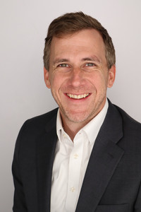 Man smiling with suit