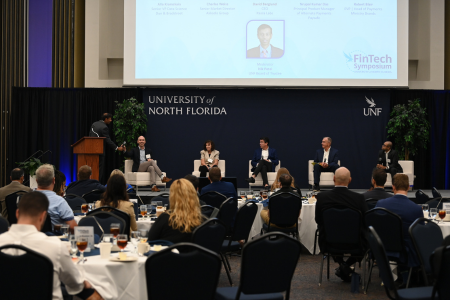 panel of 5 business professionals with a moderator 