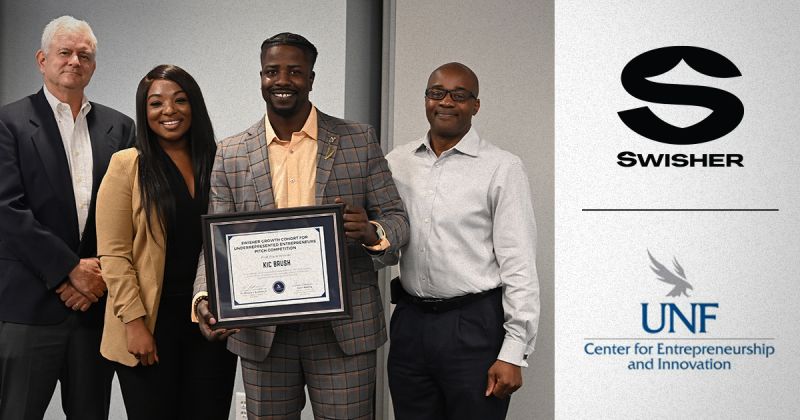 4 people posing with award and Swisher and UNF Center of Entrepreneurship and Innovation logo  