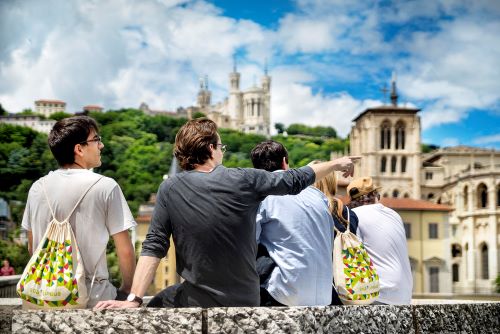 students sitting and one student is pointing