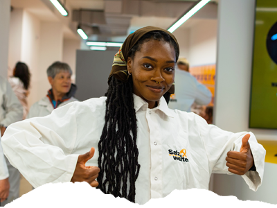 student in a lab coat