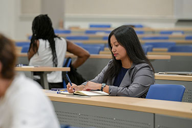 student studying in a classroom