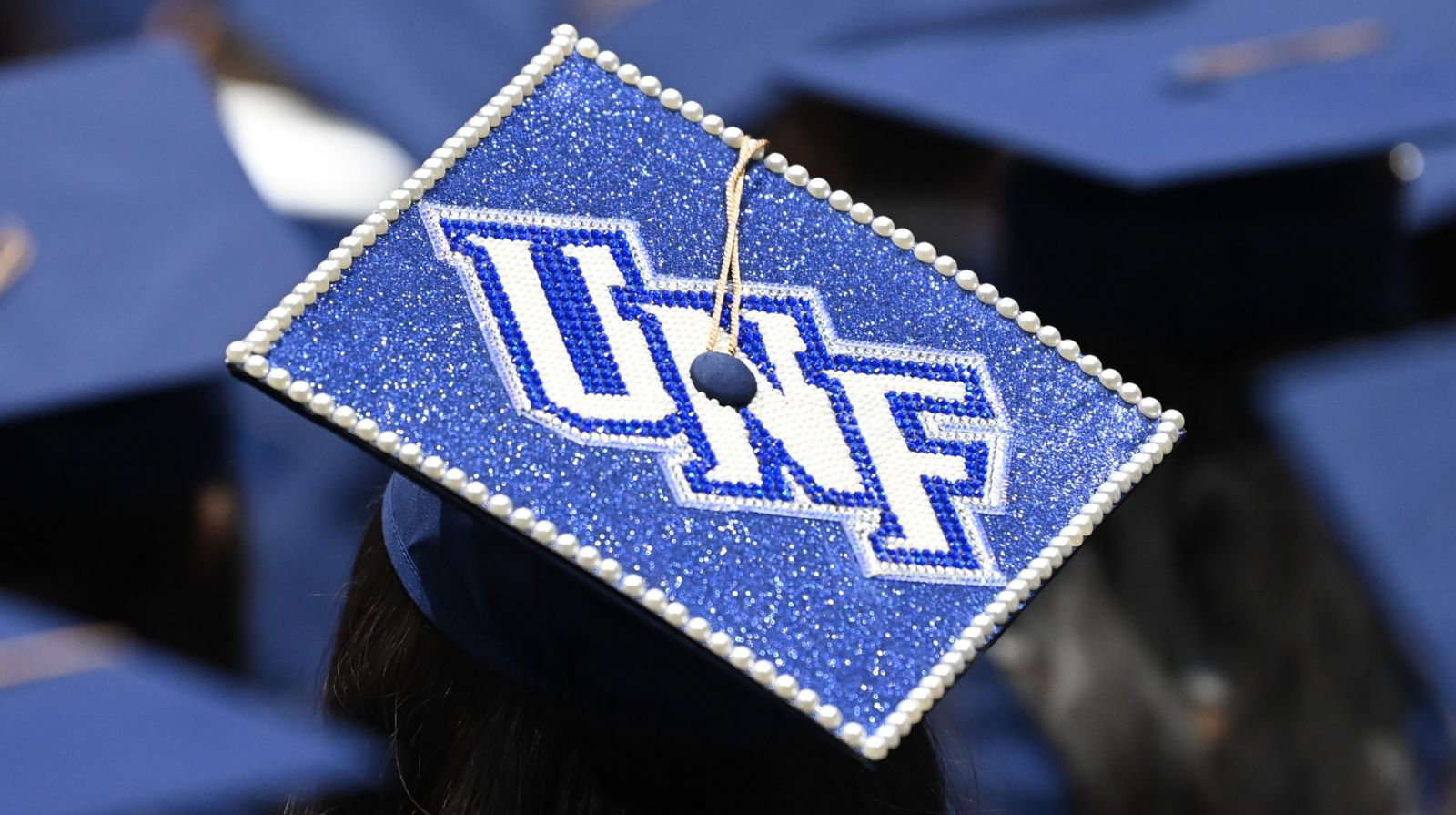 UNF mortarboard cap.