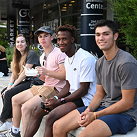 four students hang out at the Student Union