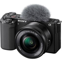 Small, black, digital camera with attached microphone