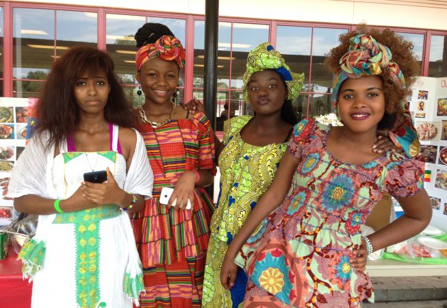 Refugee girls in traditional clothing