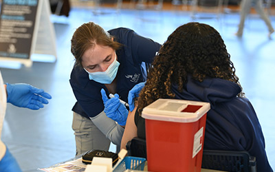 Student getting a vaccination