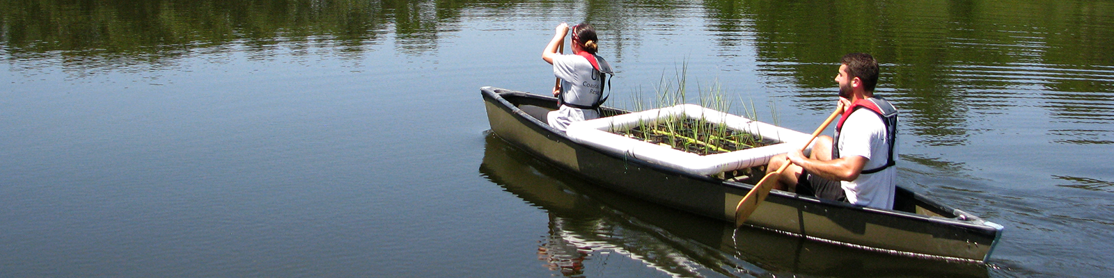 Students in a canoe doing research