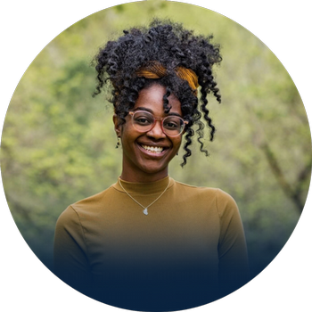 Headshot of Leandra Taylor with nature background.