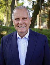 Headshot of David Strickland.