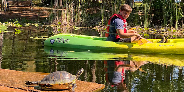 Kayaker on water.
